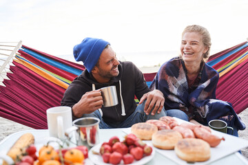 Couple laughing out loud of some joke