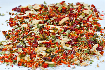 A mixture of different spices close up. Texture with colorful spices and condiments on a white background.