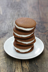 homemade chocolate whoopie pie with marshmallow filling