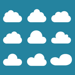 White cartoon clouds set isolated on blue background. Collection of different cartoon clouds for background template, wallpaper and sky design. Cartoon clouds vector. Sky illustration