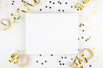 Christmas canva mockup with golden festive decoration ribbon, stars on a white background. Design element for Christmas and New Year congratulation, thank you, greeting or invitation card, art work