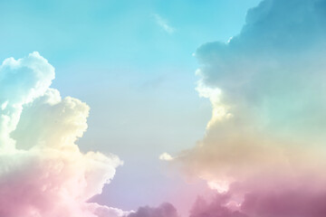 Fantasy world. Picturesque view of beautiful magic sky with fluffy clouds, toned in pastel rainbow...