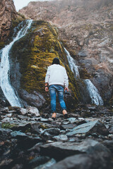 man and waterfall (orange)