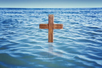 Wooden cross in river for religious ritual known as baptism