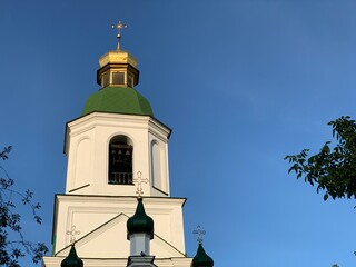 Domes of an old church. The roof of the cult building. Dome of a medieval temple. Concept: religion, temples.
