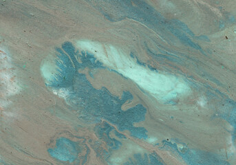 Abstract marble background, hand painted texture, painted with acrylics, splashes, drops of paint, paint strokes. Design for backgrounds, wallpapers, covers and packaging.