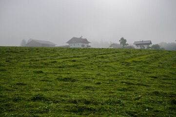 A village on the horizon in the fog