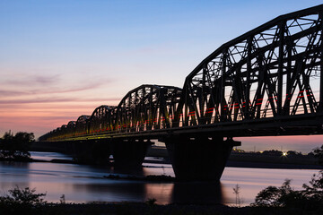 Fototapeta na wymiar 日本　静岡県磐田市、天竜川の橋と電車の軌跡