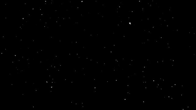 snow falling on black background