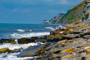 Fototapeta na wymiar sea rocky coast on a sunny summer day