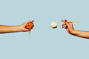 Hands with eggs. Modern art collage in pop-art style. Hands isolated on trendy colored background...