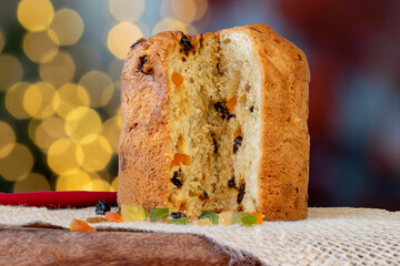 Panettone, Italian Christmas Cake with candied fruits, with blurred background.