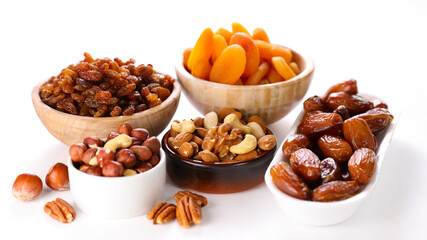 nuts and dried fruit on white background