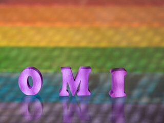 inscription omi - man mean, on background of lgbt flag