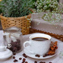 cup of coffee with cookies and flowers