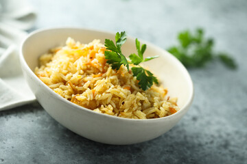 Homemade spicy rice with carrot and parsley