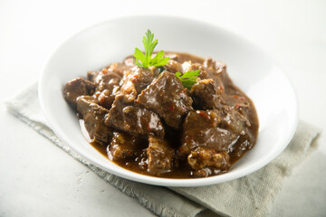 Traditional homemade beef ragout with fresh parsley