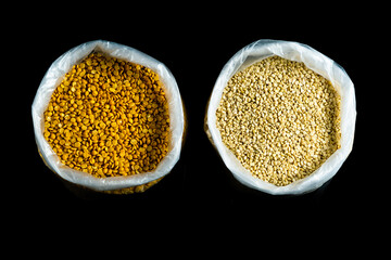 split yellow gram and black gram in bags