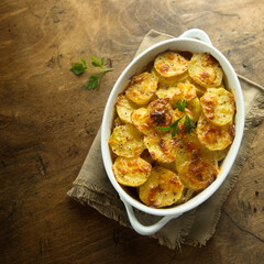 Traditional homemade potato gratin with cheese