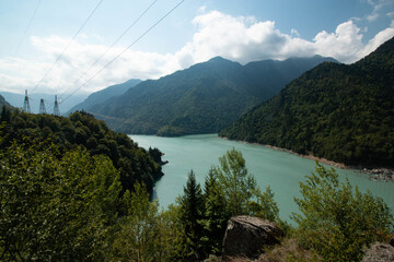 Fototapeta premium blue lake between green mountains