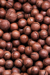 Macadamia nut close-up, background, texture, place for text