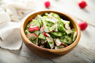 Healthy vegetable salad with cucumber and radish