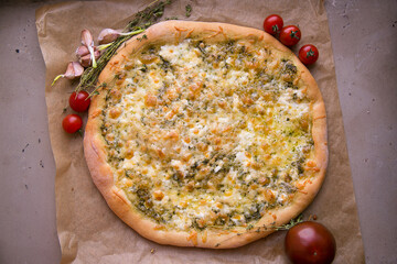 Focaccia with cheese, white pizza on Kraft paper