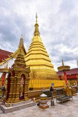 Naklejka premium Wat Phra That Cho Hae, Sacred Buddhist Site of Phrae