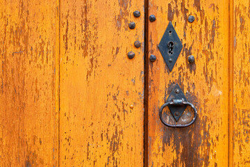Ancient baroque door detail, Tiradentes, Minas Gerais, Brazil