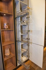 Modern kitchen cupboard design in a luxury apartment