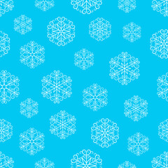 Snowflake seamless winter pattern. Vector Christmas pattern on a blue background. For wrapping paper or fabric