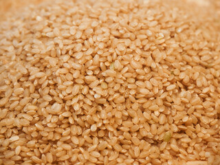 Close up of Brown rice, unpolished rice background