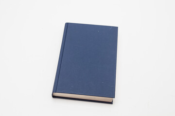 Dark blue book on white background