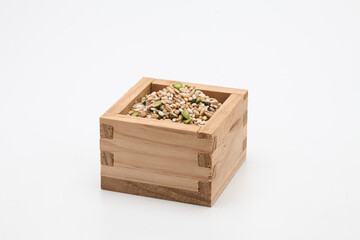 Miscellaneous grains in measure wooden cup