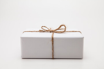 Parcel in white wrapping paper isolated