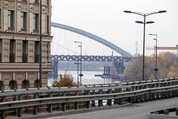 cityscape with building, river, bridge, road