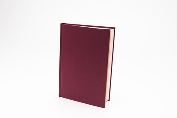  Red color book on white background