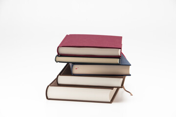 Stack of books pile on white background