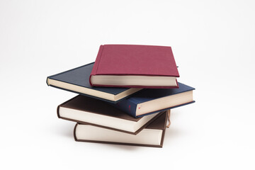 Stack of books pile on white background