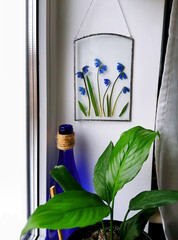 Handmade stained Glass window with Herbarium of Dried Flowers and dried herbs in a metal frame made...