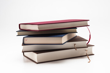 Stack of books pile on white background