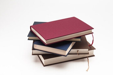 Stack of books pile on white background