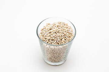 Unhulled barley transparent glass cup