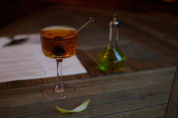 Whisky cocktail in vintage glass manhattan black cherry