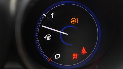 Fuel Gauge and Indicator Lights of Starting and Stopping Car Close Up