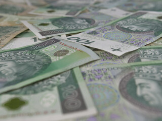 Polish Currency 100 Zloty Bills Cash on a Table