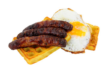 Grilled pork sausages and fried egg on a potato waffle isolated on a white background