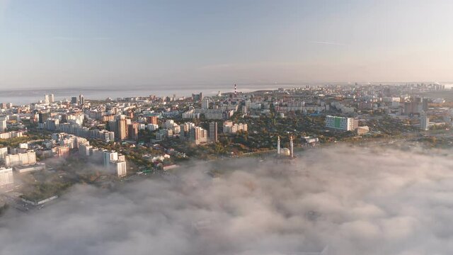 Aerial view of Al-Rahim or al-Raheem mosque in Ufa city. Beautiful Ufa City landscape. City buildings and river on background. Aerial Drone shot. 