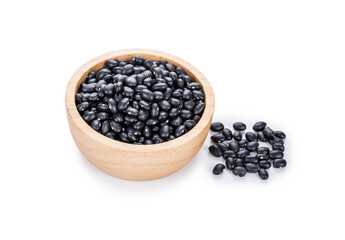 Black beans in a wooden bowl on white.