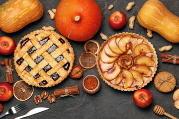 Berry tart pie and apple tart pie on black background